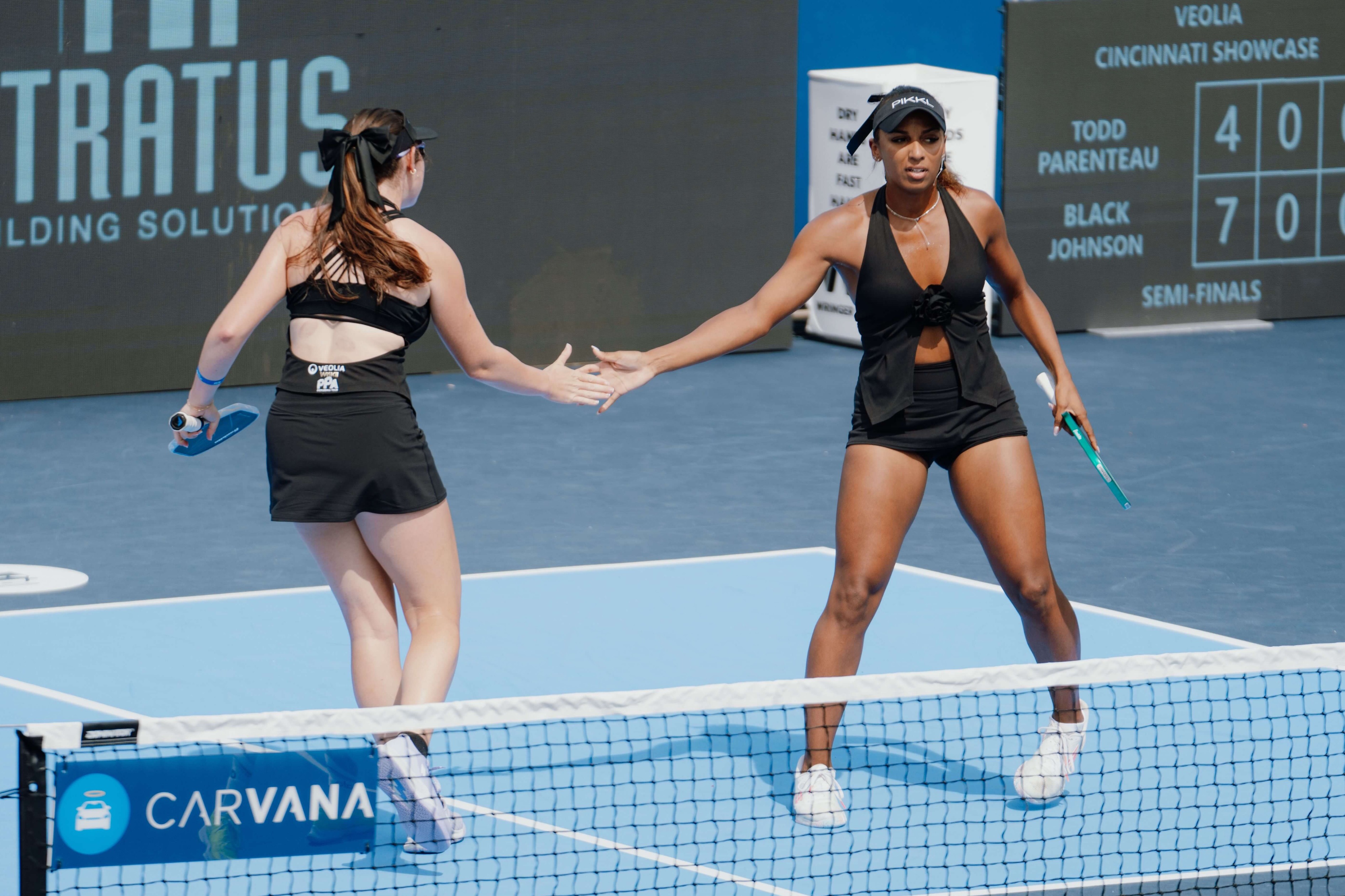 Jorja and Tyra in black halter tops